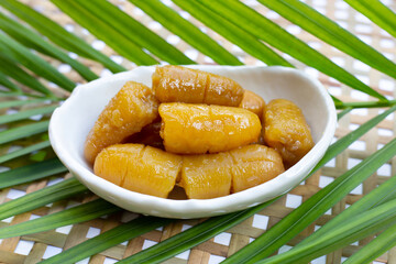 Banana in syrup. Sweet dessert