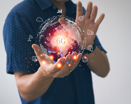 Hand shows the digital world with 6G technology,Internet of things concept