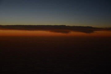 Morning views of the horizon - sunrise over the Atlantic while flying at 30K feet