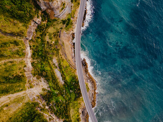 Sea cliff bridge at the edge of steep sandstone cliff on the Grand Pacific drive along pacific...