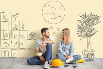 Happy couple planning design of their new house