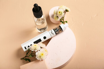 Modern vape mod, oil and flowers on beige background