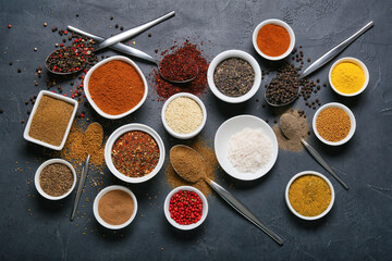 Set of aromatic spices on dark background