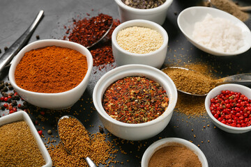 Set of aromatic spices on dark background, closeup