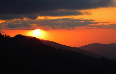 The sun coming from under clouds - Great Smoky Mountains National Park, Tennessee