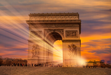 Fototapeta na wymiar Paris Arc de Triomphe (Triumphal Arch) in Chaps Elysees at sunset - Paris, France.