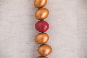 Golden  eggs. The minimal concept. An Easter card with a copy of the place for the text.