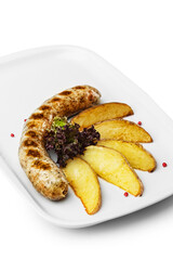 Pork sausage, meat in a plate. Photo of food on a white background