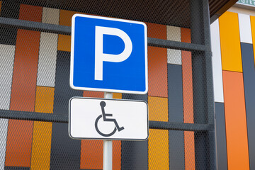 Close-up of road signs Parking and Disabled. Disabled person only parking space
