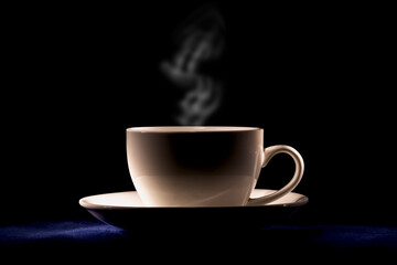 cup of coffee on black background