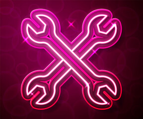Glowing neon line Wrench spanner icon isolated on red background. Spanner repair tool. Service tool symbol. Vector