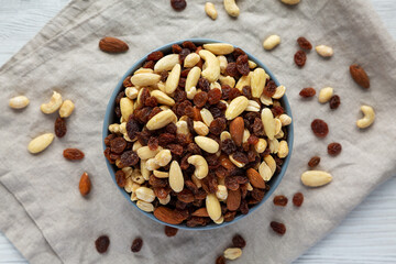 Raw Trail Mix with Nuts and Fruits in a Bowl, top view. Flat lay, overhead, from above.