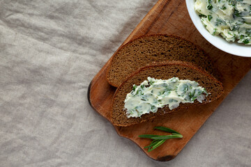 Homemade Herb Butter with Rosemary and Parsley, top view. Flat lay, overhead, from above. Space for text.