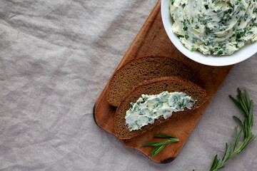 Homemade Herb Butter with Rosemary and Parsley, top view. Flat lay, overhead, from above. Copy space.
