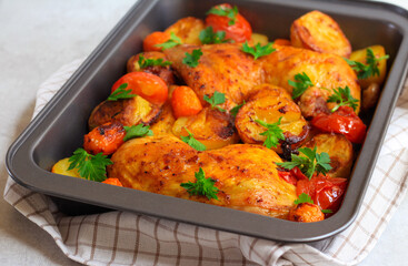 Roast chicken legs with potatoes,