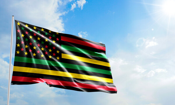 Juneteenth Freedom Day or Emancipation Day. Waving Flag of American African Black history month over a sunny day background