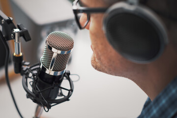 Professional speaker recording a live podcast
