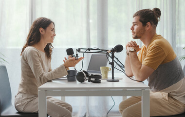 Young speaker conducting a podcast interview