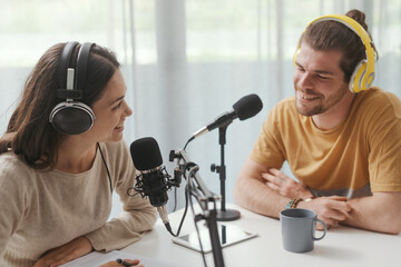 Young speaker conducting a podcast interview
