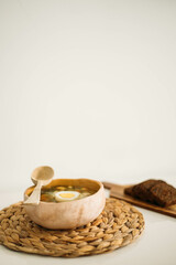 green borsch with egg and sour cream