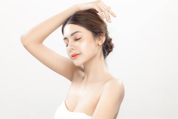 Beautiful woman model with clean fresh skin on white background, Female portrait Face care, plastic...