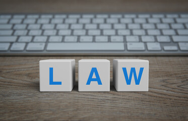 LAW letter on white block cubes on wooden table with modern computer keyboard, Frequently asked...