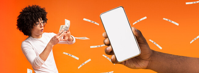 Man holding money and big white empty smartphone screen