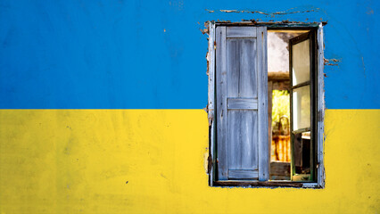 Broken window on a Ukraine flag colored  wall .
