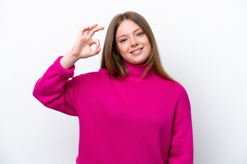 Young caucasian woman isolated on white background showing ok sign with fingers