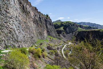 Basalt columns Symphony of Stones near the shore of the river Azat near the village Garni, Armenia.Tourism landmark in Armenia