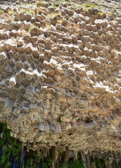 Basalt columns Symphony of Stones near the shore of the river Azat near the village Garni, Armenia.Tourism landmark in Armenia