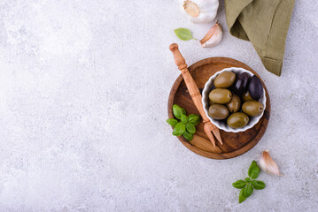 Bowl with Greek green and black olives