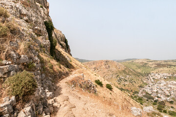 View  from Mount Arbel to the adjacent valley on the coast of Lake Kinneret - the Sea of Galilee, near the city of Tiberias, in northern Israel