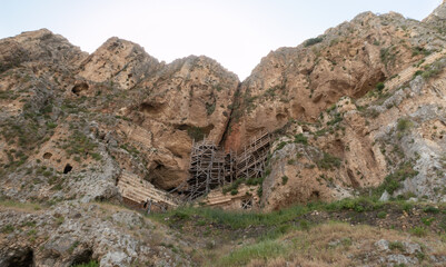 Fototapeta premium Reconstruction of the old fortress on Mount Arbel, located on the coast of Lake Kinneret - the Sea of Galilee, near the city of Tiberias, in northern Israel