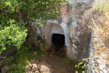 The remains  of the buildings of the ancient settlement on Mount Arbel, located on the coast of Lake Kinneret - the Sea of Galilee, near the city of Tiberias, in northern Israel