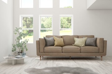 White living room with leather sofa and summer landscape in window. Scandinavian interior design. 3D illustration