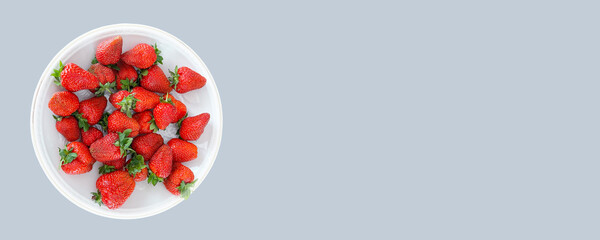 Strawberry plate. flat lay horizontal banner, place for text.