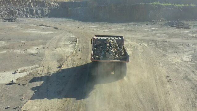 Granite quarry. Extraction of granite. Open cast mine. Stone Quarrying - Aerial view