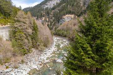 Fototapeta na wymiar Small rhine river in Grison in Switzerland