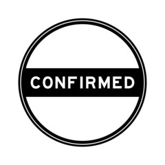 Black color round seal sticker in word confirmed on white background