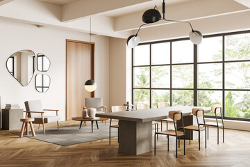 Light meeting room interior with chairs and table, panoramic window