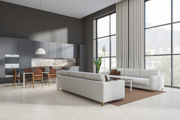 Corner view on dark studio room interior with panoramic window,