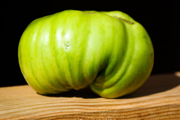 Green tomato bull's heart close-up
