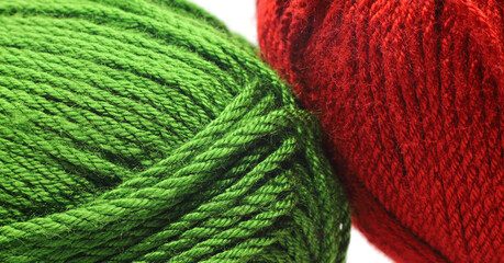close-up red and green wool yarn balls