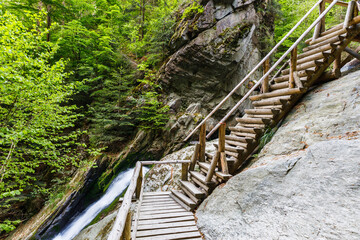 Wooden walking path at Resov waterfalls in the Czech Republic