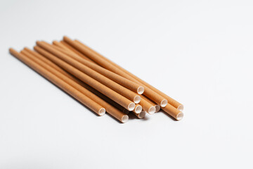 Close-up of bamboo straws on white background.