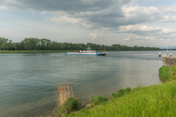 Fototapeta na wymiar Ferry of Rhinau - Kappel carrying vehicles and passengers.