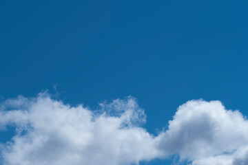 Obraz premium Blue sky with white clouds. Heavenly landscape background.