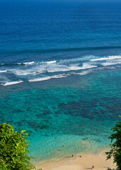 Bali Melasti Beach. View from above to the tropical beach with turquoise crystal clear water.  No people