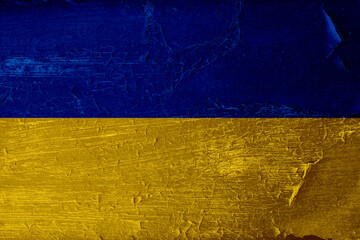 Blue cracked paint on wood vintage texture with ukrainian flag. Painted old wooden aquamarine wall background. Pray for Ukraine. Safe Ukraine